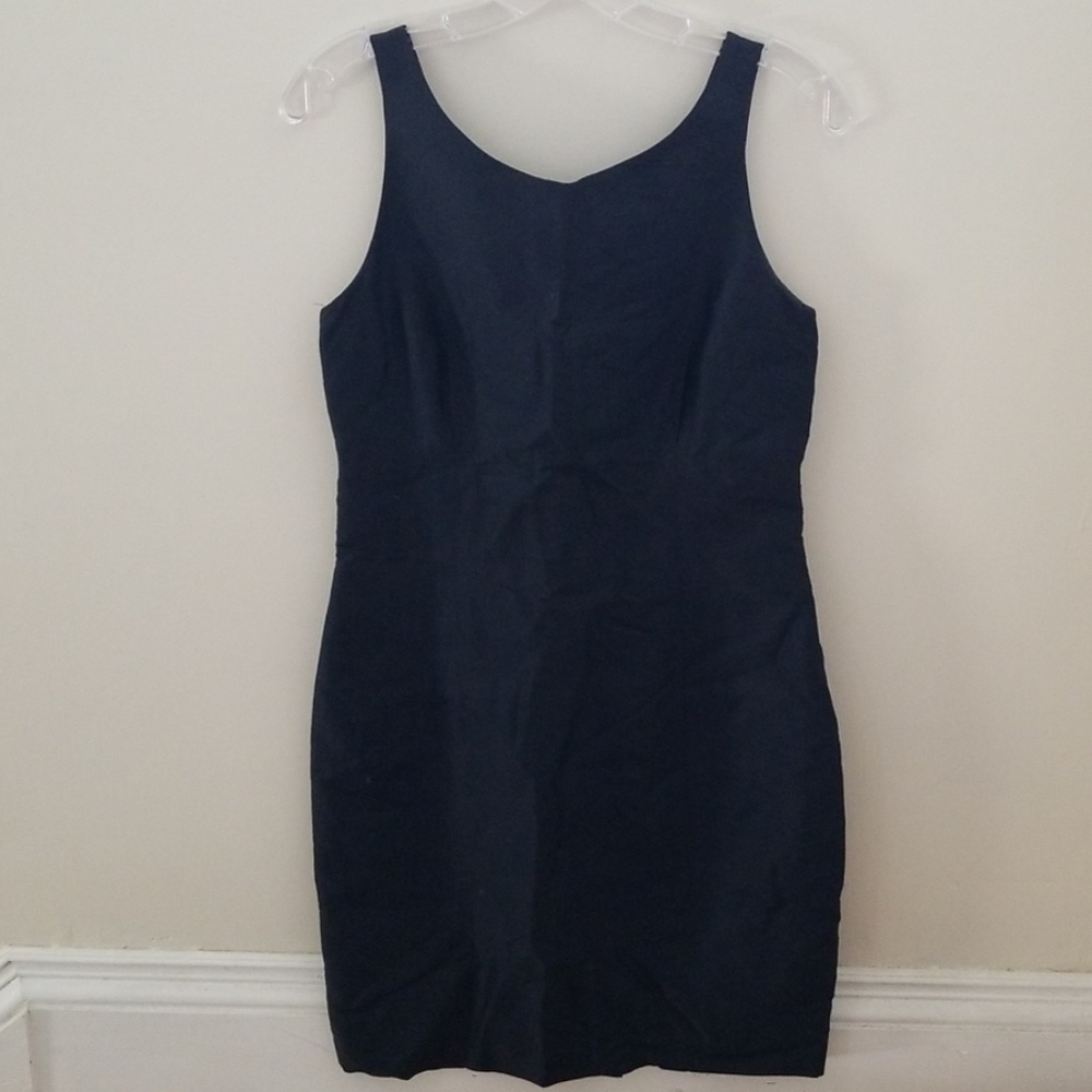 A navy silk dress.